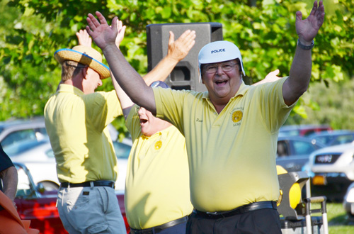 Russ Martino, a member of the Lyndonville Lions Club, leads the crowd in doing the motions to the song “YMCA” during a concert by Crash Cadillac in July 2014. The band from Buffalo performed at the Yates Town Park along Lake Ontario at the end of Morrison Road. Martino was the town supervisor when Yates created the park about seven years ago. Current Town Supervisor John Belson, center, and Jeff Johnson join in the dance. The concert was sponsored by the Lions Club, which also takes the lead in the annual Lyndonville Fourth of July celebration.