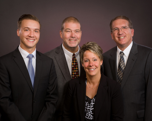 Photo courtesy of Bruce Landis: Christopher Mitchell Funeral Homes in Albion and Holley has four full-time funeral directors, from left: Josh Mitchell, Scott Schmidt, Paula Fuller and David Mitchell.