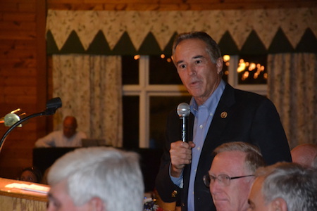 Chris Collins, R-Clarence, addresses about 200 people at the Republican rally. Collins in April was the first member of Congress to endorse Donald Trump for president.