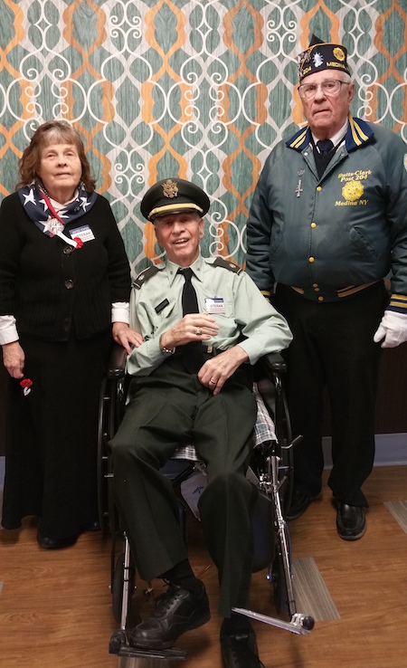 Visiting veteran Frank Berger, back right, is shown with resident Henry Christian proudly wearing his Army uniform. He was accompanied by his wife Victoria, who served in the Air Force. Members of their church family from Old Paths Bible Baptist Church in Clarendon were also present.