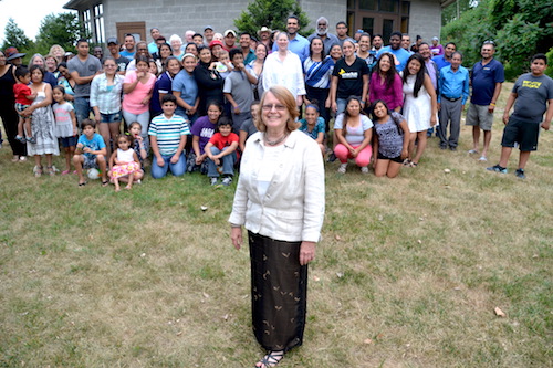 Linda Redfield is pictured on July 16 during a surprise party for her by many of her students at the World Life Institute in Waterport.
