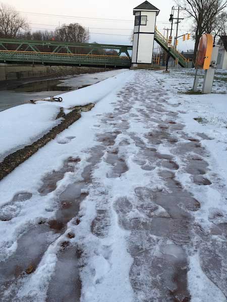 Photo by Tom Rivers: The canal path leading to the lift bridge on Ingersoll Street in Albion is icy on late Sunday afternoon. 2017 is the beginning of an eight-year bicentennial for the Erie Canal’s construction, which occurred from 1817 to 1825.