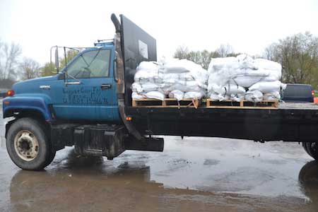 Image result for fertilizer bags on pick up truck