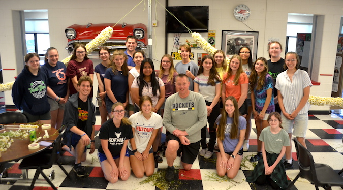 Daisy chain endures at least a century as graduation tradition in Medina