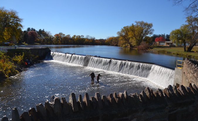 Fishermen venture by Lyndonville dam in search of salmon | Orleans Hub