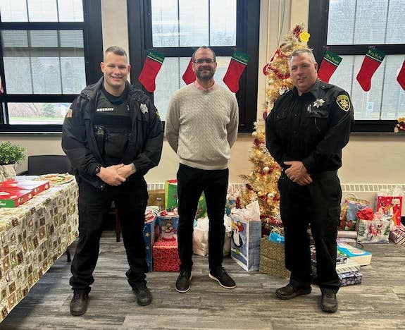 Orleans County Jail division gives presents to Albion students ...